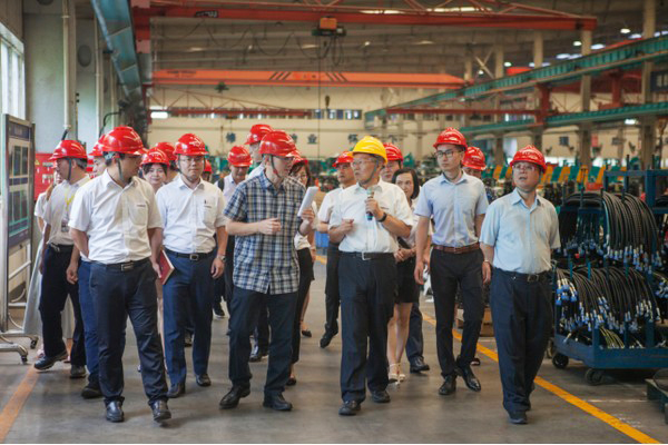 商务部合作司刘民强副司长一行调研k豆钱包智能