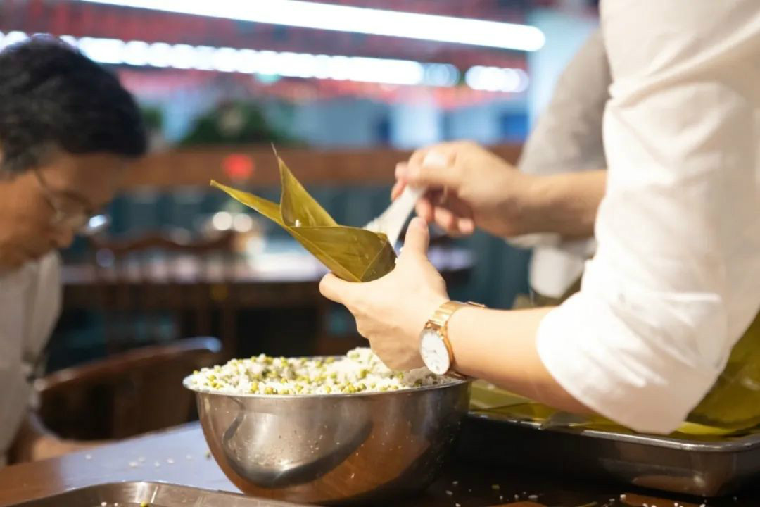 “爱国心，k豆钱包情”k豆钱包智能第四届包粽子角逐