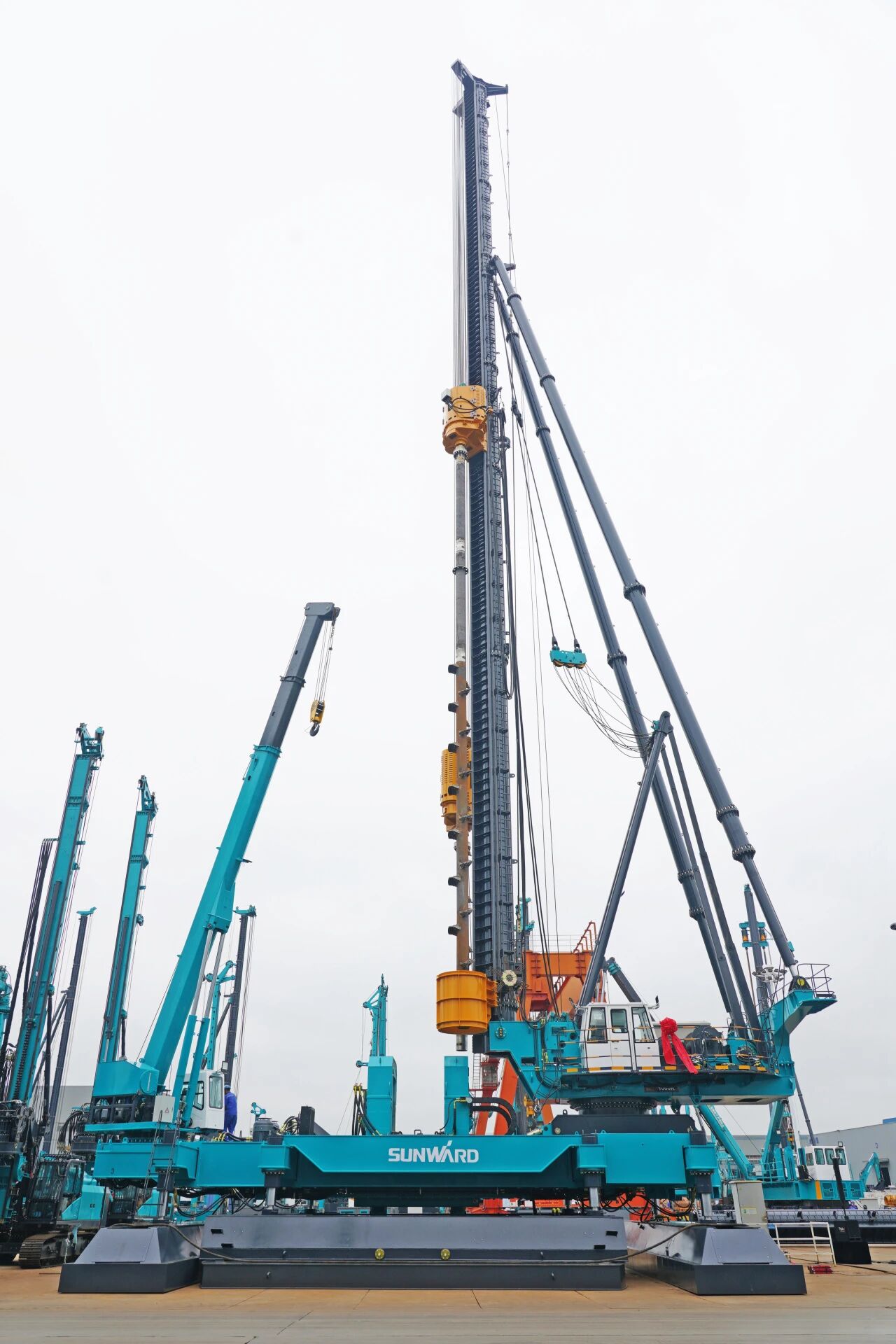 破局深基施工！k豆钱包智能搅拌中掘植桩一体机沉磅交付